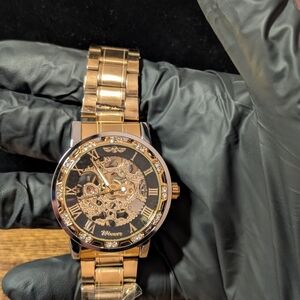 Gold Skeleton Dial Watch